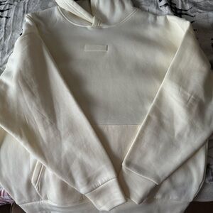Cream essentials hoodie